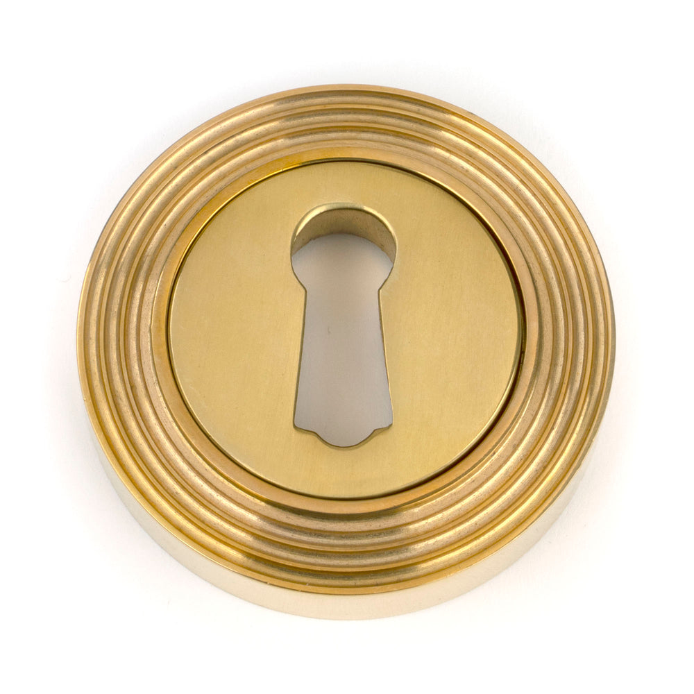 Polished Brass Round Escutcheon (Beehive)