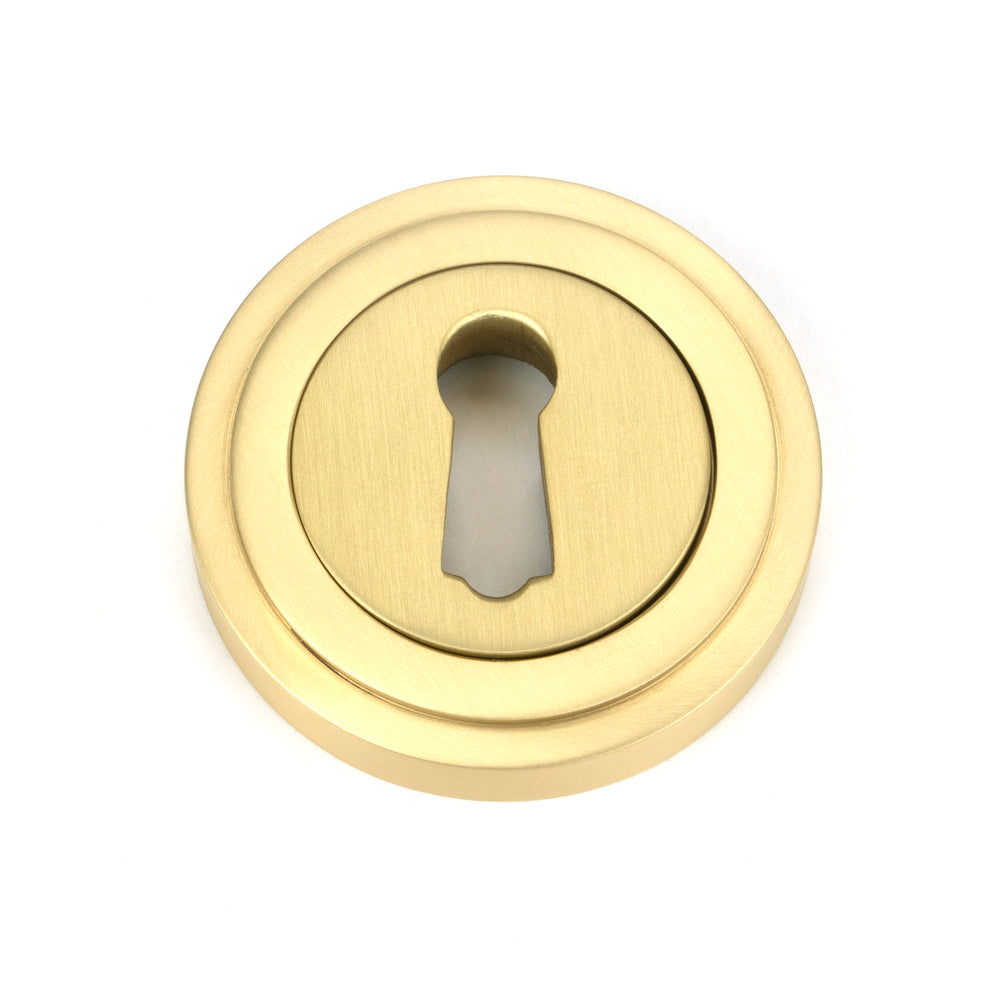 Satin Brass Round Escutcheon (Art Deco)