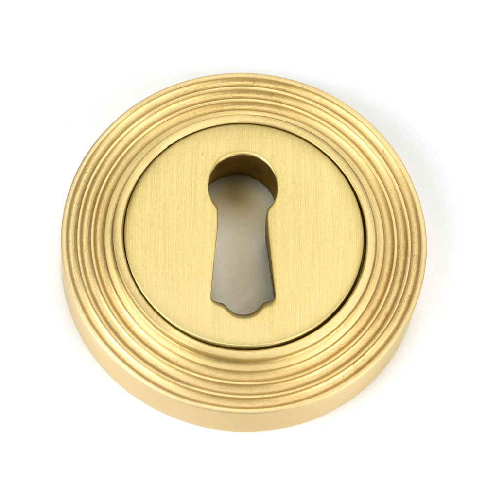 Satin Brass Round Escutcheon (Beehive)