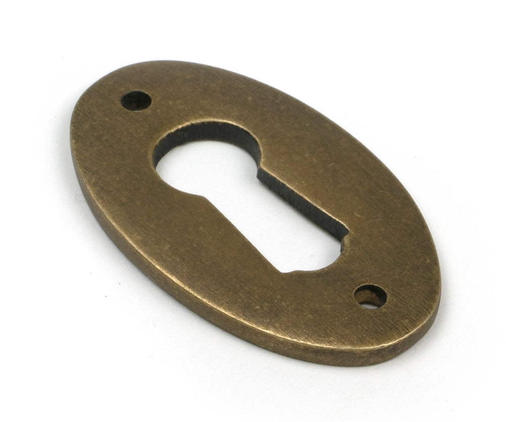 Burnished Brass Oval Escutcheon