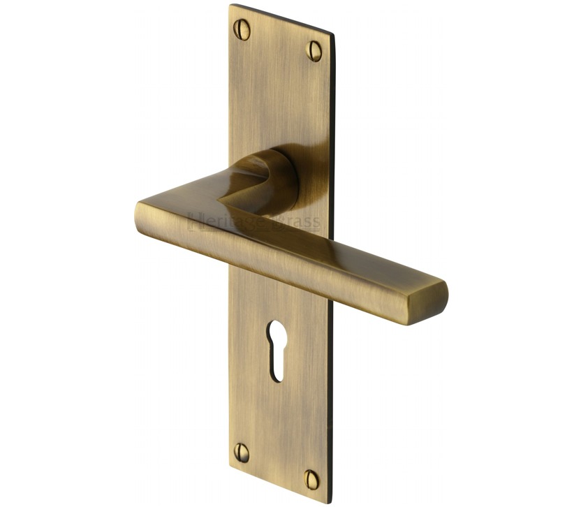 Heritage Brass Trident Low Profile Door Handles On Backplates, Antique Brass –   (sold In Pairs)