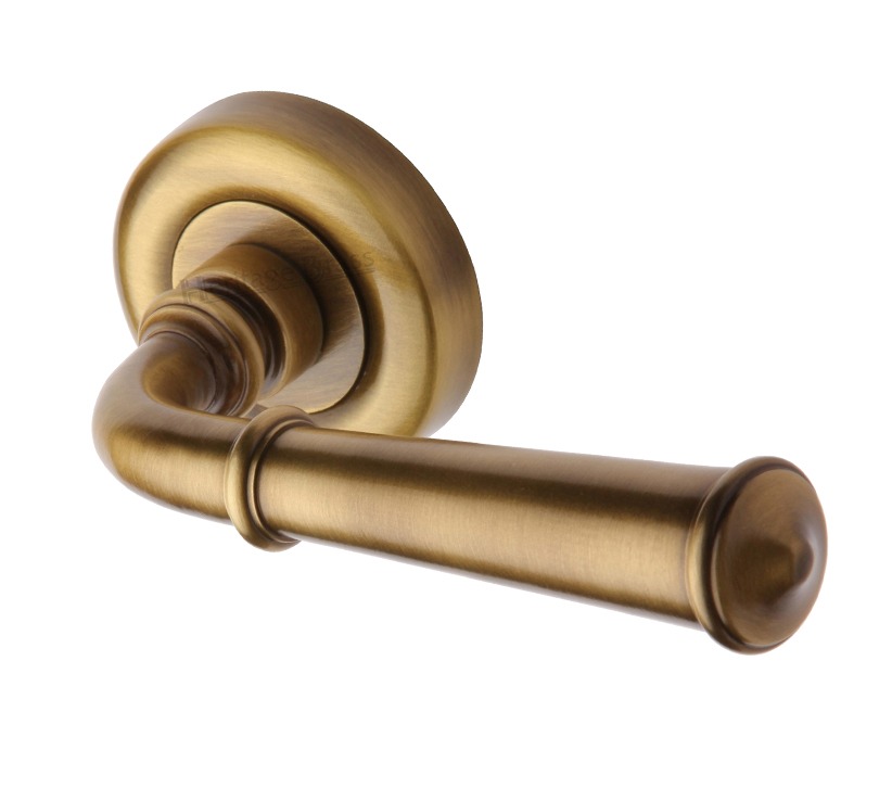 Heritage Brass Colonial Antique Brass Door Handles On Round Rose (sold In Pairs)